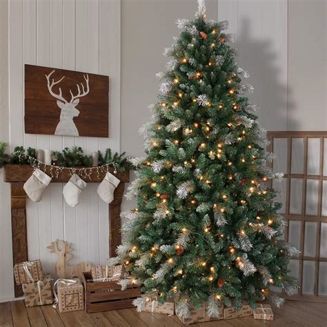 This realistic and full-bodied tree features hinged branches, a sturdy metal base, and a convenient onoff foot switch. . Amazon pre lit xmas trees